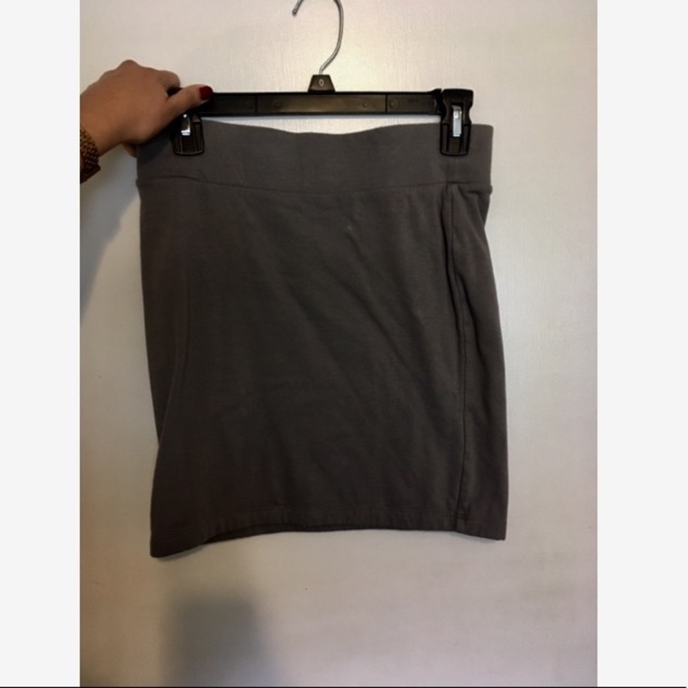 Dark gray, form fitting skirt